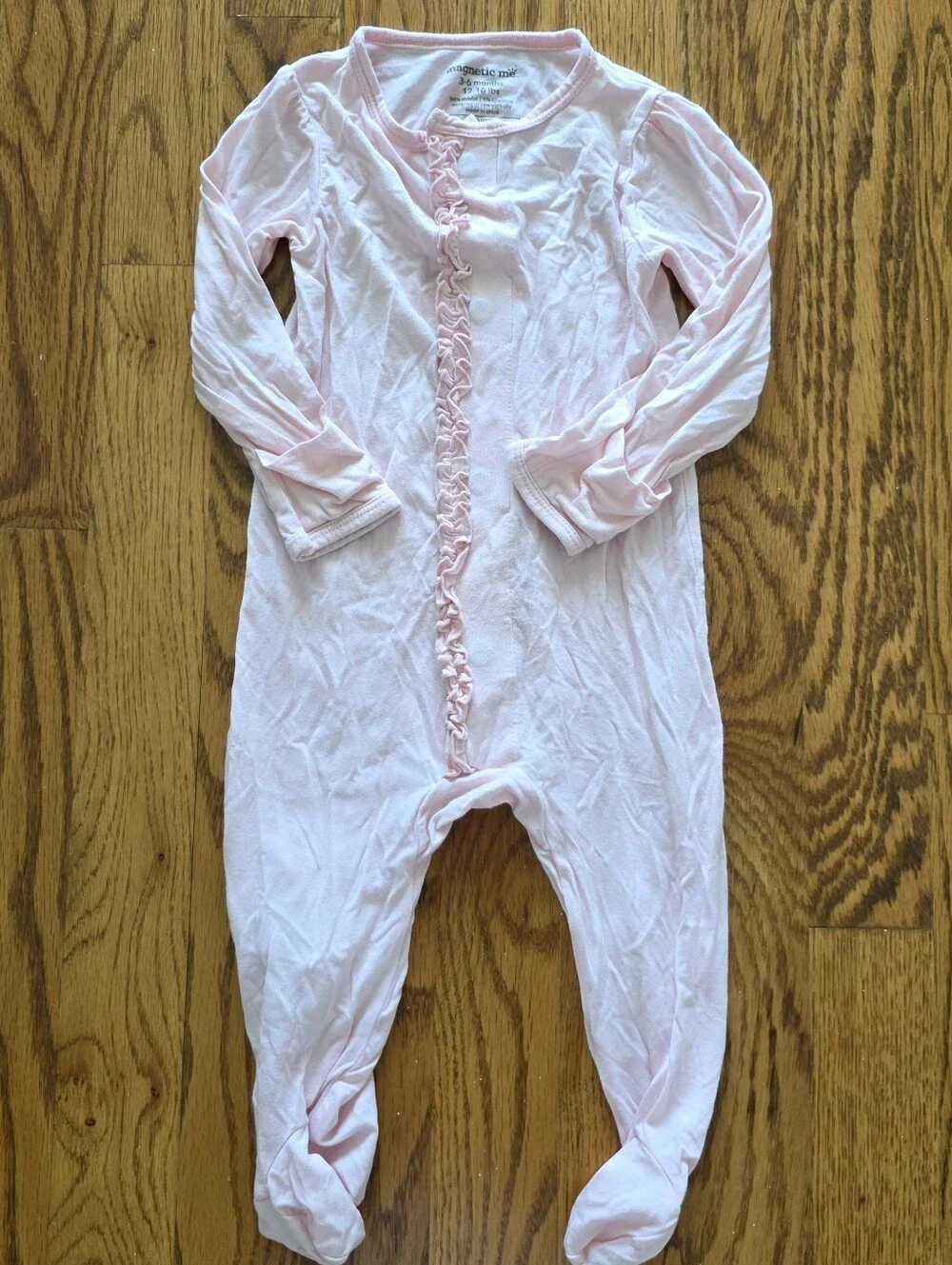 Magnetic Me Baby Pale Pink Ruffle-Front Footed One-Piece
